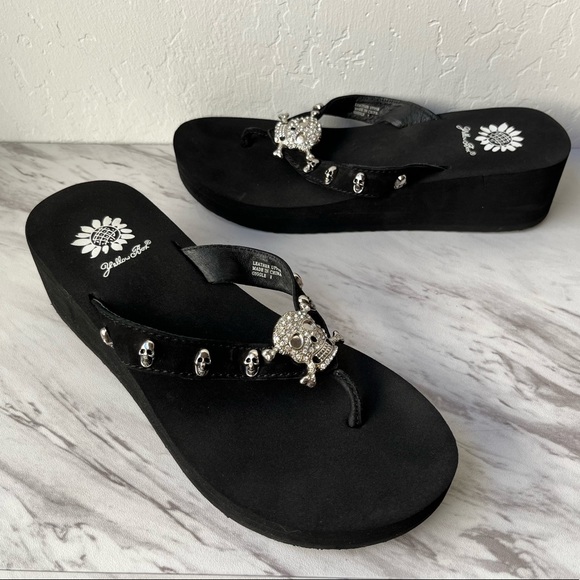 yellow box skull flip flops